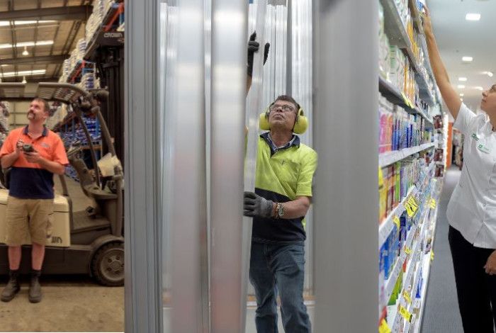 image of three people at work