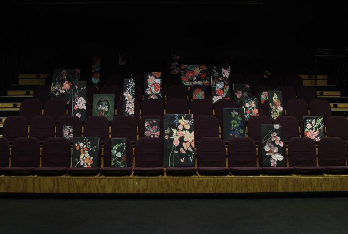 24 floral paintings by artist Josephine Mead installed on theatre seats.