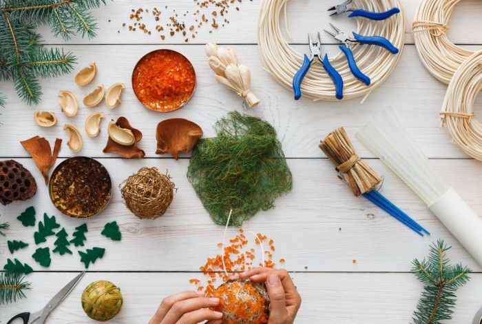 A table with Christmas craft materials. 