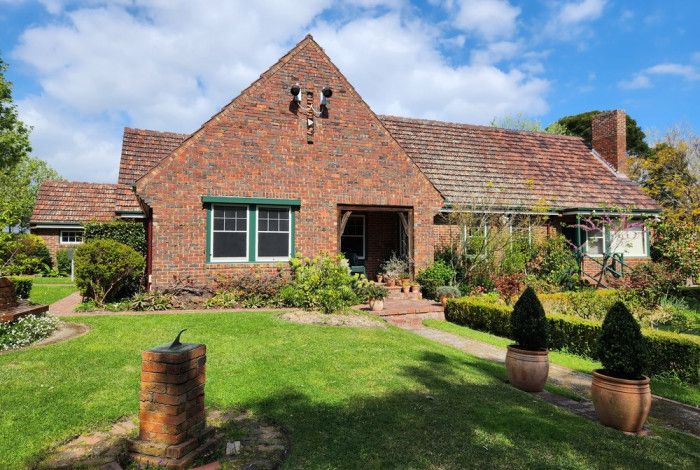 A coloured image of 1936 Benga house at Heritage Hill Museum and Historic Gardens