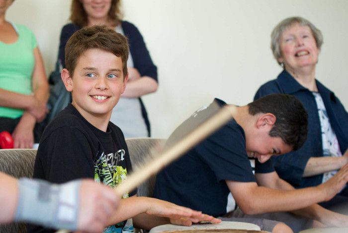 A child playing drums