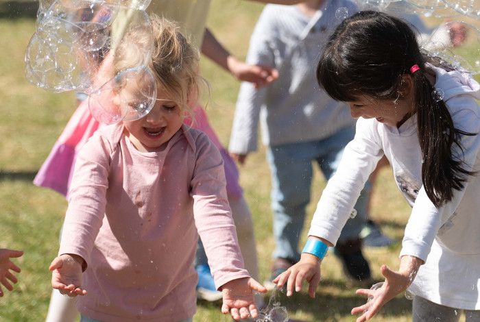 Children playing with bubbles