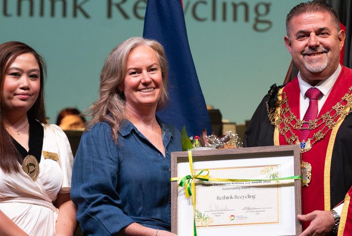 Kym O’Shannassy – Rethink Recycling receiving her award from the Mayor and Deputy Mayor