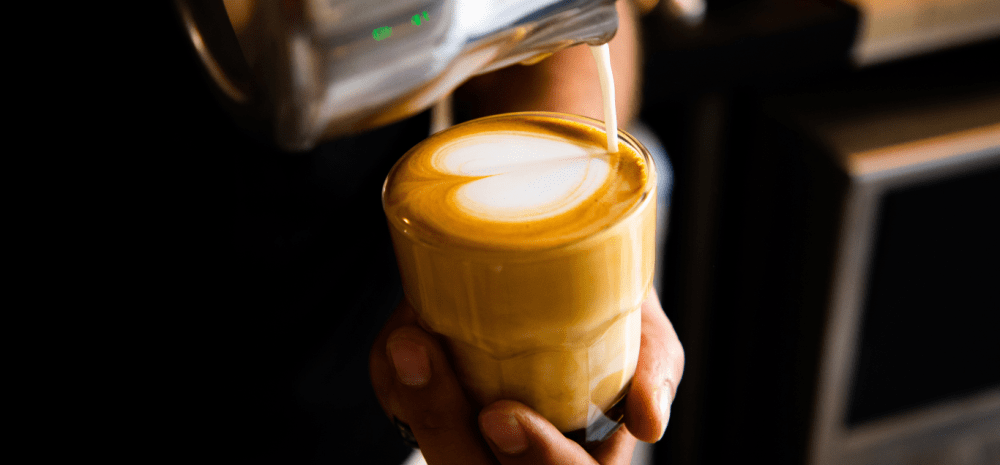 Cup of coffee being poured