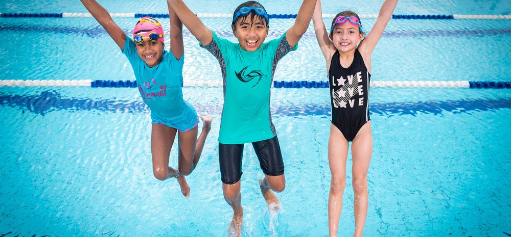 Children swimming in a pool