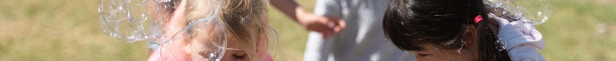 Children playing with bubbles