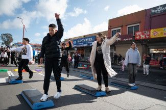 People taking part in step aerobics