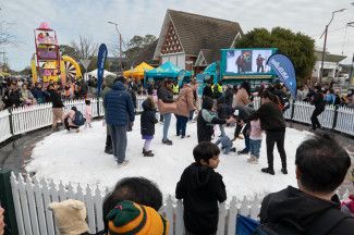 A group of people playing in the snow