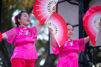 Chinese dancers performing on a stage